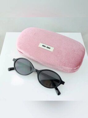 Miu Miu Black Oval Slim Frame Sunglasses